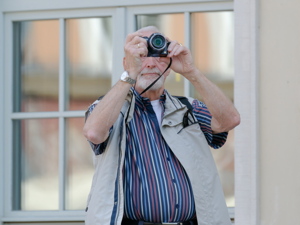Old man photographing